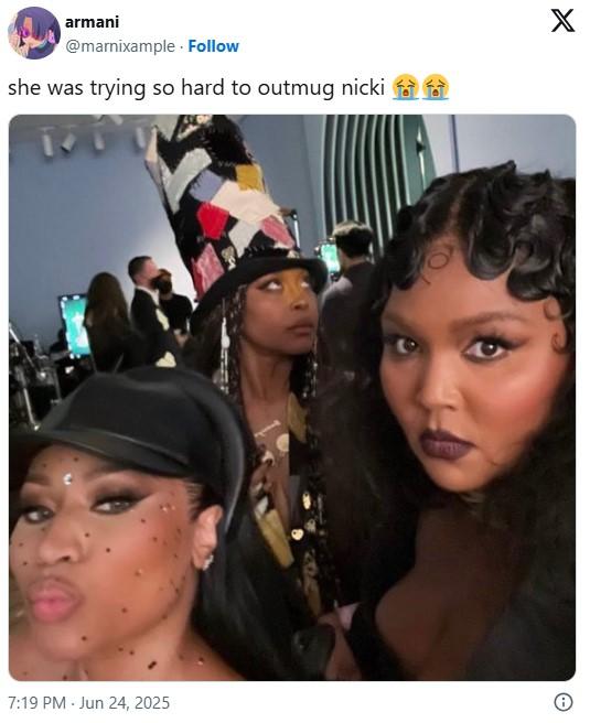 she was trying so hard to outmug nicki 😭😭 A tweet by @marnixample. The tweet reads, "she was trying so hard to outmug nicki 😭😭" and shares a photo of Nicki Minaj and Lizzo.