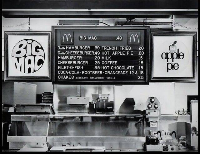 BiG MAC M BIG MAC Double HAMBURGER 39 FRENCH FRIES Double CHEESEBURGER.49 HOT APPLE PIE HAMBURGER CHEESEBURGER FILET-O-FISH 49 M .20 20 20 MILK .15 apple .25 COFFEE .15 35 HOT CHOCOLATE .15 pie 25 COCA-COLA ROOTBEER ORANGEADE.12 &.18 SHAKES CHOCOLATE STRAWBERRY VANILLA