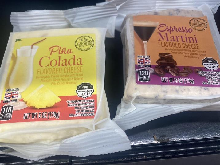 IMPORTED FROM ENGLAND 110 CALORIES PER 102 SERVING EMPORIUM SELECTION Piña Colada FLAVORED CHEESE Wensleydale Cheese blended with Diced Pineapple, Diced Peaches & Natural Piña Colada flavoring NET WT 6 OZ (170g) not treated with rBST* "NO SIGNIFICANT DIFFERENCE HAS BEEN SHOWN BETWEEN MILK DERIVED FROM TBST-TREATED AND NON-BST-TREATED COWS IMPORTED FROM ENGLAND 120 CALORIES PER 102 SERVING EMPORIUM SELECTION Espresso Martini FLAVORED CHEESE Wensleydale Cheese blended with Chocolate Coated Coffee Beans & Natural Espresso Martini flavoring NET WT 6 OZ (170g) not treated with TBST* "NO SIGNIFICANT DIFFERENC HAS BEEN SHOWN BETWE MILK DERIVED FR BST-TREATED NON-BST-TREATED