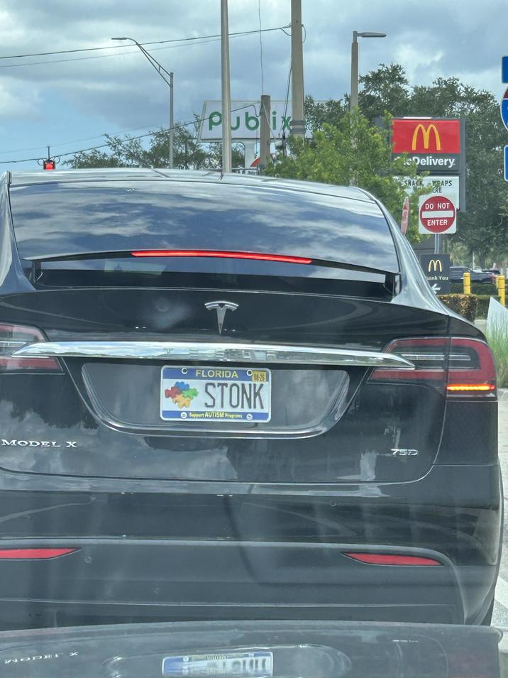 MODEL X Publi M Delivery SNACK PAPS ERE DO NOT ENTER T O FLORIDA O 03-26 STONK Support AUTISM Programs O 75D 3 ank You