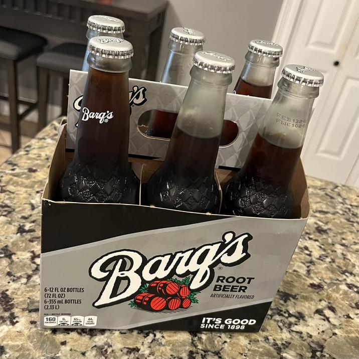 Bang Barg's FEB 1326 FWE 1026 6-12 FL OZ BOTTLES (72 FL OZ) 6-355 mL BOTTLES (2.13 L) PER BUTTLE SERVIN 160 O CALORIES SAT FAI 65 Barg's 44 TRIAL SUGARS BEER ARTIFICIALLY FLAVORED IT'S GOOD SINCE 1898