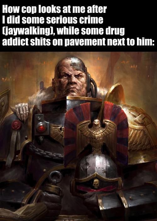 How cop looks at me after I did some serious crime (jaywalking), while some drug addict s---- on pavement next to him: