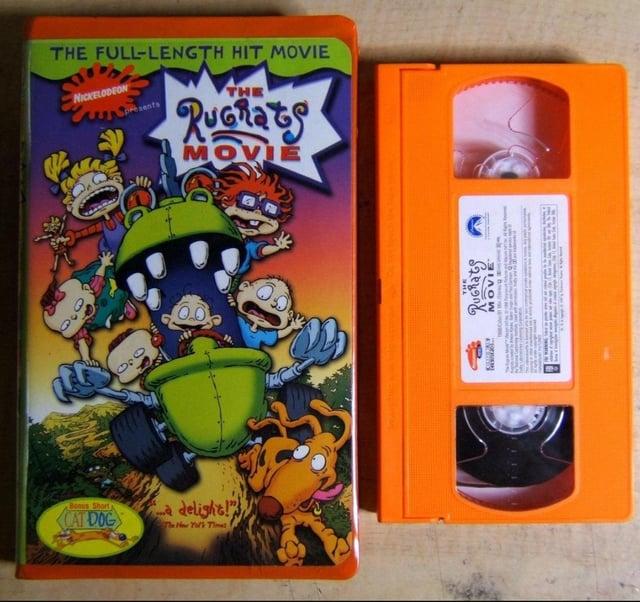 030 THE FULL-LENGTH HIT MOVIE NICKELODEON Spresents THE 030 Bonus Short CAT DOG a delight!" The New Yor's Timet Rugrats MOVIE тик Rugrats MOVIE