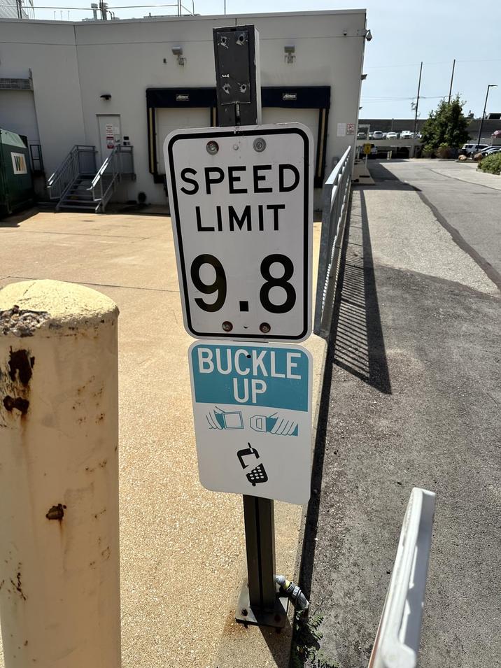 SPEED LIMIT 9.8 BUCKLE UP
