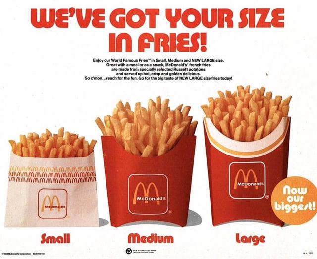 WE'VE GOT YOUR SIZE IN FRIES! Enjoy our World Famous Fries" in Small, Medium and NEW LARGE size. Great with a meal or as a snack, McDonald's french fries are made from specially selected Russett potatoes and served up hot, crisp and golden delicious. So c'mon... reach for the fun. Go for the big taste of NEW LARGE size fries today! mmmmmmmm m m m m m n mmmmmmmmmmm mmm mmmmmmmm mm mm mm McDonald McDonald's McDonald's Που Our biggest! Small Medium large