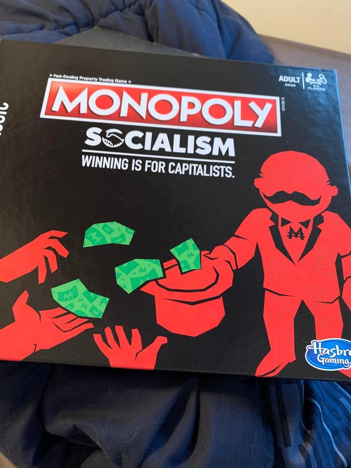 Fast-Dealing Property Trading Game MONOPOLY SOCIALISM WINNING IS FOR CAPITALISTS. M M MA4 ADULT E8029 PLAYERS Hasbr Gaming