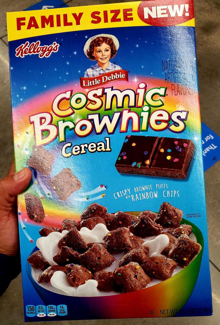FAMILY SIZE NEW! Kellogg's Little Debbie ARTIFICE FLAVORE Cosmic Brownies Cereal CRISPY BROWNIE PUFFS RAINBOW CHIPS WITH ENLARGED TO SHOW TEXTURE 150 0.5 CALORIES SAT FAT 3% DV 140mg SODIUM 6% DV 14 TOTAL SUGARS NET WT 13.202 (374g) чеч