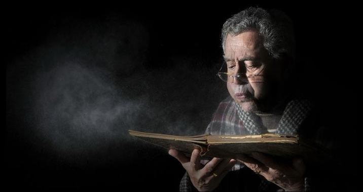 Senior Blowing Dust Off Book Reaction Image A reaction image. The meme shows an old man blowing dust out of a book.