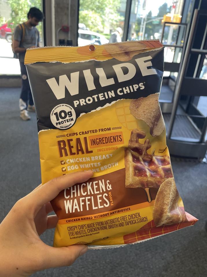 WILDE OD SOURCE GOOD OF PROTEIN 10g PROTEIN PER SERVING PROTEIN CHIPS wwwwwww.CHIPS CRAFTED FROM REAL INGREDIENTS INCLUDING CHICKEN BREAST EGG WHITES NE BROTH CHICKEN & WAFFLES CHICKEN RAISED WITHOUT ANTIBIOTICS CRISPY CHIPS MADE FROM ANTIBIOTIC-FREE CHICKEN, EGG WHITES, CHICKEN BONE BROTH AND TAPIOCA STARCH No Artificial Ingredients Minimally Processed Enlarged