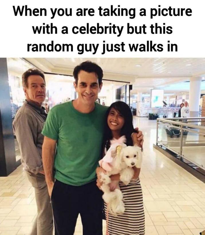 When you are taking a picture with a celebrity but this random guy just walks in