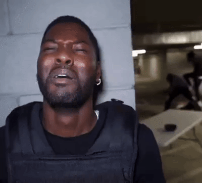 RDCWorld Mark Phillips Reaction GIF of Security Guard And Guy Getting Jumped In Background A "GIF":https://knowyourmeme.com/memes/cultures/gif of a black male security guard crying and acting scared as a man is seen in the background getting beaten up, or jumped, by other men. The GIF was originally shared as a "viral video":https://knowyourmeme.com/memes/viral-videos on "Twitter / X":https://knowyourmeme.com/memes/sites/twitter-x by RDCWorld member Mark Phillips.