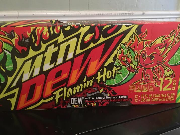 Tak DEW en Flamin' Hot DEW with a Blast of Heat and Citrus Flavor with Other Natural Flavors 1700 CALORIES SAT FAT 55 SODIUM TOTAL SUGARS 12 12-12 FL OZ CANS (144 FL OZ) 12-355 mL CANS (4.26 LITER) cans