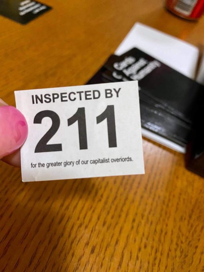 INSPECTED BY 211 for the greater glory of our capitalist overiords.