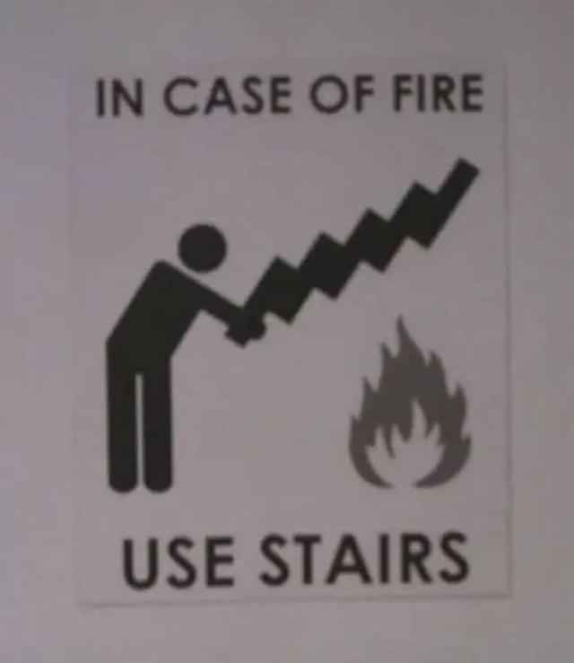 IN CASE OF FIRE USE STAIRS