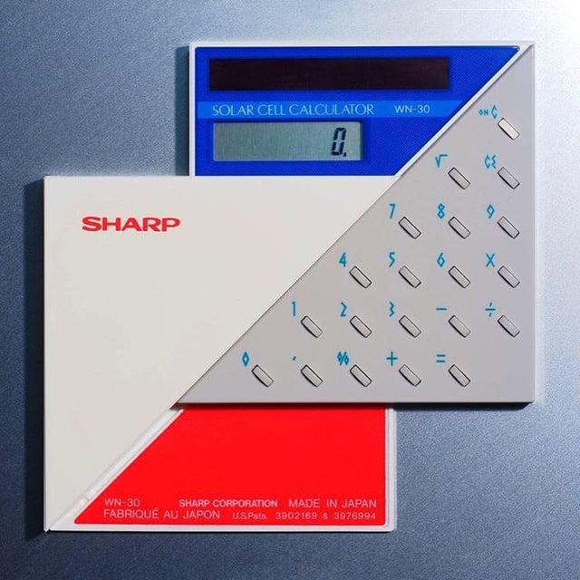 SHARP SOLAR CELL CALCULATOR WN-30 > 10 10 O + 10 b XO O WN-30 SHARP CORPORATION MADE IN JAPAN FABRIQUE AU JAPON US.Pats. 3902169 & 3976994