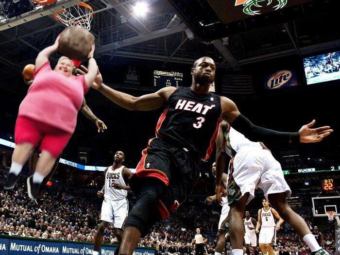 A version of the "Dwyane Wade and LeBron Dunk":https://knowyourmeme.com/memes/wade-lebrons-dunk-picture image with the AI Lady With Rock Breaking Glass Bridge "photoshopped":https://knowyourmeme.com/memes/sites/photoshop in.