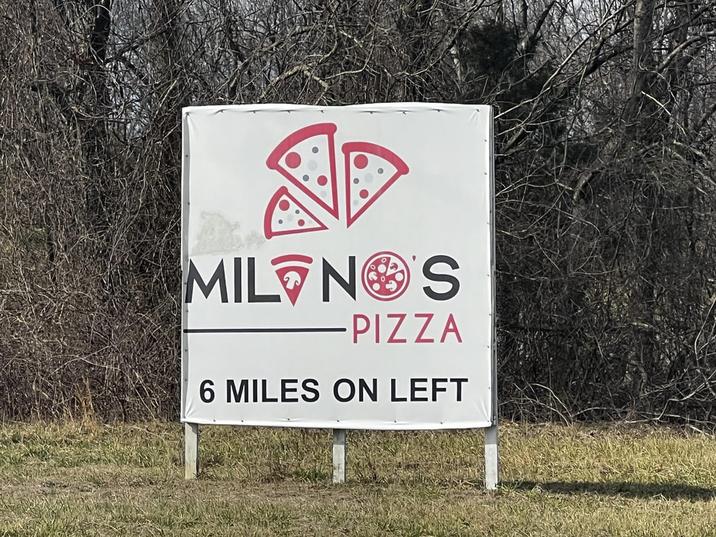 ND MIL NOS PIZZA 6 MILES ON LEFT