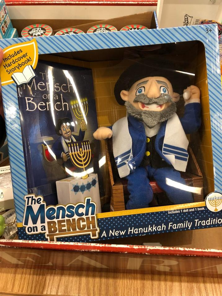 Includes Hardcover Storybook! Soundb ONDE TH Mersch or a Bench லை 3+ The Mensch on a BENCH Includes 1 doll and 1 book. A New Hanukkah Family Traditio