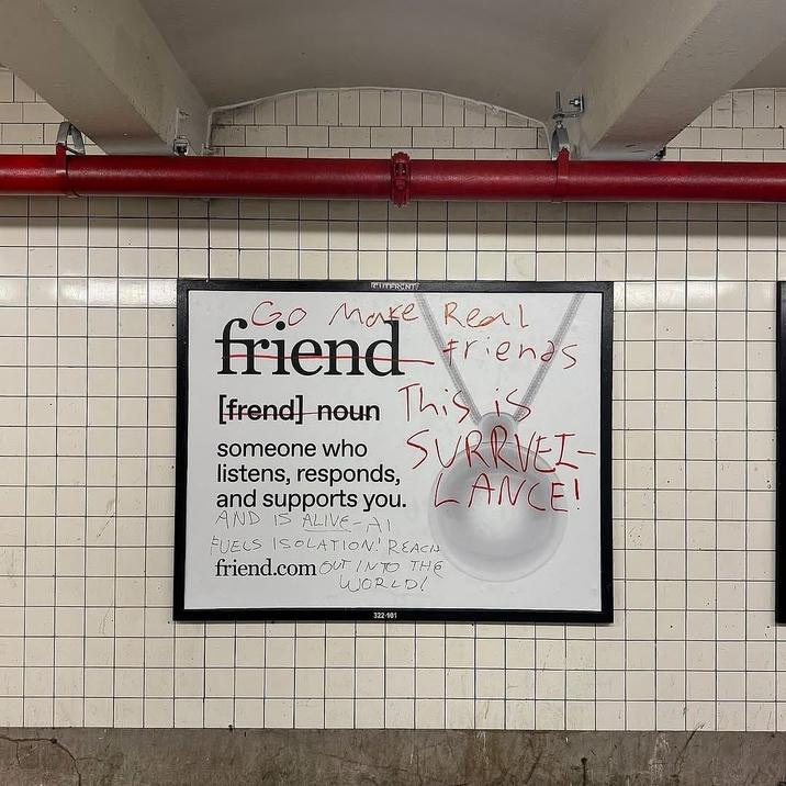 An example of the Friend AI NYC subway ad campaign being graffitied in early October 2025, shortly after it launched.