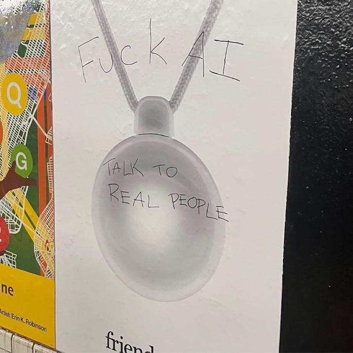 An example of the Friend AI NYC subway ad campaign being graffitied in early October 2025, shortly after it launched.