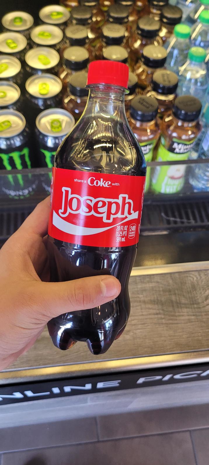 share a Coke with Joseph 20 FL OZ 240 (1.25 PT) 591 ml CALORIES PER BOTTLE NLINE PIC