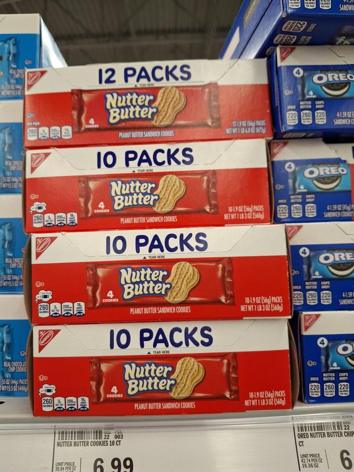 E550 H ORED CALORIES PER PACK SANDWI De PER PACK 260 ARE HABISCO D COOKIES 12 PACKS A TEAK BERE Nutter Butter 10 PEANUT BUTTER SANDWICH COOKIES IO PACKS A TEAR HERE Nutter Butter 12-19 02 (56) PACKS NET WT1 18 6.30277) Do OREO BUTTER CHIPS GRES BUTTER AHOV 220 260 220 4-1.59 OZ SANDWICH C OREO REAL CHOCO CHIP COO 55 02 (44) P T-1550214 REAL CHOCO CHIP COO 55 02 (44) P ETT-15.502 14 260 200 260A NABISCO UD COOKIES PEANUT BUTTER SANDWICH COOKIES IO PACKS COOKIES 260 3 200 15 CALORIES SAT FAT SODIUM ADDED UD A TEAR HERE Nutter Butter PEANUT BUTTER SANDWICH COOKIES IO PACKS A TEAR HERE Nutter Butter 10-1.9 02 (56) PACKS NET WT 1 LB 3 02 (560) Do NUTTER CHIPS ORED BUTTER 220 260 220 10-1.9 02 (569) PACKS NET WT 1 LB 3 OZ (560g) DO 41.59 02 (45) P SANDWICH COOKIES ORE BUTTER CHIPS ORED BUTTER AHOY! 220 260 220 4-1.59 SANDWICH 10 NUTTER CHIPS OREO BUTTER AHOY! 220 260 220 REAL CHOCOLAT CHIP COOKIE 55 OZ (44) PACKS TWT-15.5 02 (440g) COOKIES 260 3 200 200 15 CALORIES SAT FAT SOCRUM PEANUT BUTTER SANDWICH COOKIES 10-1.902 (56) PACKS NET WT 1 LB 3 OZ (560g) PER PACE CALONES PER PACK CALORIES PER FACE 22 003 NUTTER BUTTER COOKIES 10 CT UNIT PRICE 36.8¢ PER OZ 6.99 JAM 22 OREO NUTTER BUTTER CHIP CT UNIT PRICE 42.7 PER OZ 16.36 OZ 6