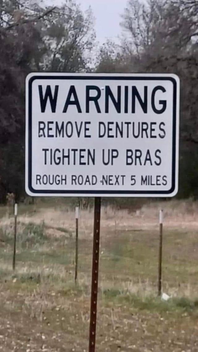 WARNING REMOVE DENTURES TIGHTEN UP BRAS ROUGH ROAD NEXT 5 MILES
