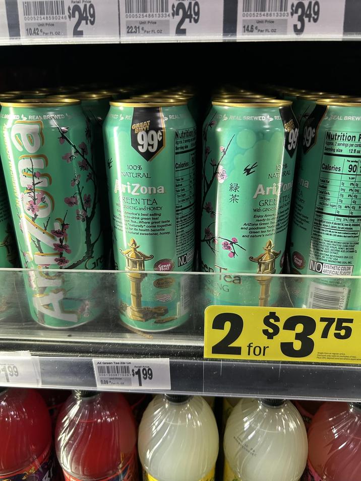 00052548590246 Unit Price 10.42 Per FL OZ Retail Price $249 00052548613334 Unit Price 22.31 Per FL OZ $249 00052548613303 Unit Price 14.6 PrFLO $349 LBREDREAS BREWED NEDRE GREAT BUY! 99 Arizona 100% NATURAL Arizona REEN TEA WENSENG and HONEY America's best selling y-to-drink green teal REALE goods "naturally" come together. en Tea... Where great taste natus natural sweetener, honey. ca for its health benefits Nutrition Approx 2 serving Serving six Great Hot! Calories Sue Bec Total Cark Took Supan WC AED FOR A OND REMER NO ED REAL SREWED RE ** REAL BREW 99 99 Nutrition F 100% NATURAL Arizon GREENTEA With GINSEN and H Enjoy Americas best ready-to-dr great Arizona Green Tea What and goodness "naturaly c Green tea for its heatt and nature's natural sweet na EA ONLY wing Treat at taste gether wefits honey. reat not! Approx. 2 servings per cont Serving size 12oz Calories 90 Total Fat Sodium Total Carb Total Sugars O 0% O Omg 0% Omg 23g 8% 43g 23g 2 Ind. Added Sugars 23g 46% 42 Vitamin C Og O 18mg 20% 33mg 35 tayarin D, cacum, iron and pot cant source of saturated it, bras i chos Ne you how much d FLORENTS PREMIUM BREWED GREEN TEA LIGING WATER H HIGH FRUCTOSE CORN SYRUP CITRIC P. HONEY MATOW ACID (VITAMIN SYRUP I ACID, ASCORBIC FOR ARDO EXTRACT RIZONA BEVERAGES USA LLC. NY 11797 USA BEVERAGE MARKETING USA INC. SYNTHETIC COLOR ARTIFICIAL FLAVOR NO MORE INFO EMA ea SENG ONEY 2.$375 Discountgular price Plus CRY deposit and tax where applicabi von multiples of two 199 AZ Green Tea 23z Cn 00613008715267 Unit Price 0.09 PFL. OZ $99