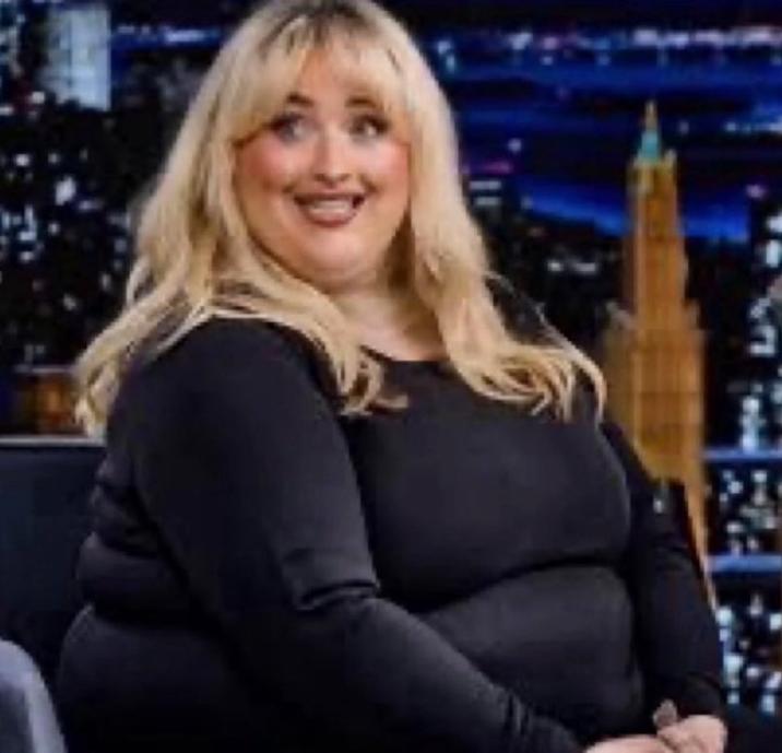 The original low-quality version of the Fat Sabrina Carpenter "meme":https://knowyourmeme.com/memes/memes, showing singer "Sabrina Carpenter":https://knowyourmeme.com/memes/people/sabrina-carpenter as a fat woman. It's an "AI":https://knowyourmeme.com/memes/cultures/ai-artificial-intelligence edited version of a photo of Carpenter on "_The Tonight Show Starring Jimmy Fallon_":https://knowyourmeme.com/memes/people/jimmy-fallon and it was used on "Twitter / X":https://knowyourmeme.com/memes/sites/twitter-x as a "reaction image":https://knowyourmeme.com/memes/reaction-images and "exploitable":https://knowyourmeme.com/memes/exploitables.
