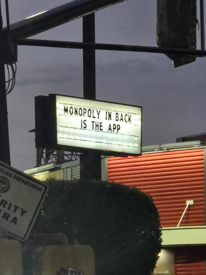 MONOPOLY IN BACK IS THE APP OLICE DEPARTMENT RITY RA