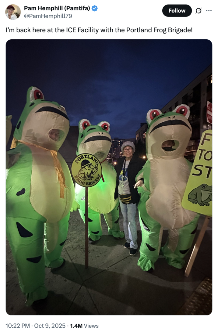 X user @PamHemphill79 posted an image posing with several people dressed in the Portland Frog costume, writing, 
