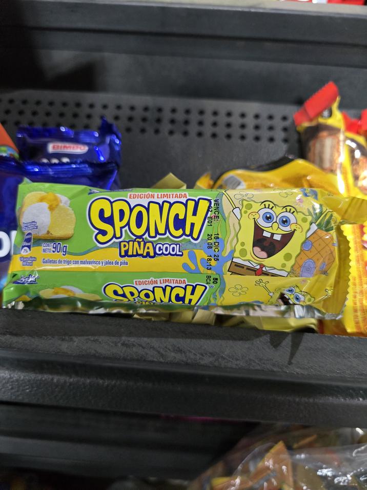 BIMBO Una porción de 30 gaporta ENERGIA 134 kcal 7% para dieta 000 kcal held CONT NETO: 90.g EDICIÓN LIMITADA SPONCH PINA COOL Galletas de trigo con malvavisco y jalea de piña EDICIÓN LIMITADA SPONCH 02E01 ENCE 16 DIC 25 20 08 18:13 BCA 50 Bg. 00NETO NET WT 45g
