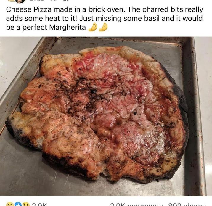 Cheese Pizza made in a brick oven. The charred bits really adds some heat to it! Just missing some basil and it would be a perfect Margherita 201 2.0K commente 802 chares