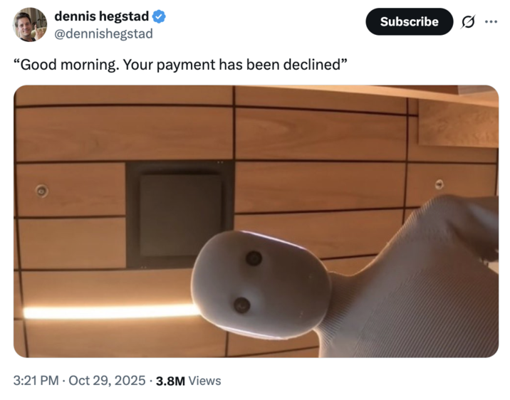 X user @dennishegstad posted an image of the Neo Home Robot looming over the camera, writing, "Good morning. Your payment has been declined"