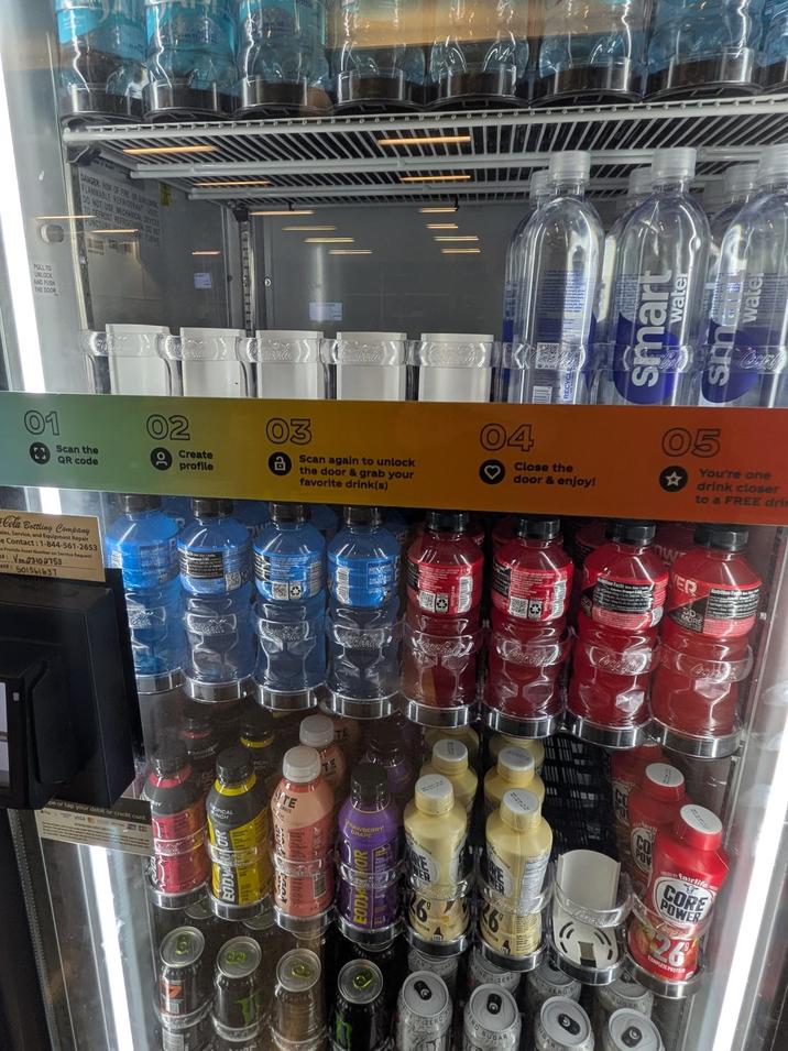 PULL TO UNLOCK AND PUSH THE DOOR DANGER: RISK OF FRE OR ERION FLAMMABLE REFRIGERANT USE DO NOT USE MECHANICAL P TO DEFROST REFRIGER UNCTURE NT OURING 01 Scan the QR code 02 Create profile Cola Bottling Company les, Service, and Equipment Repair Le Contact: 1-844-561-2653 Provide Asset Number on Service Request Vm3102763 t: 501561637 be or tap your debit or credit card UNCH smart water water Cocal 03 a Scan again to unlock the door & grab your favorite drink(s) 04 Close the door & enjoy! 05 ☆ You're one drink closer to a FREE dri ER TE AWBERRY fairlife CORE POWER 26 COMPLETE MPLETE PROTE ZERO