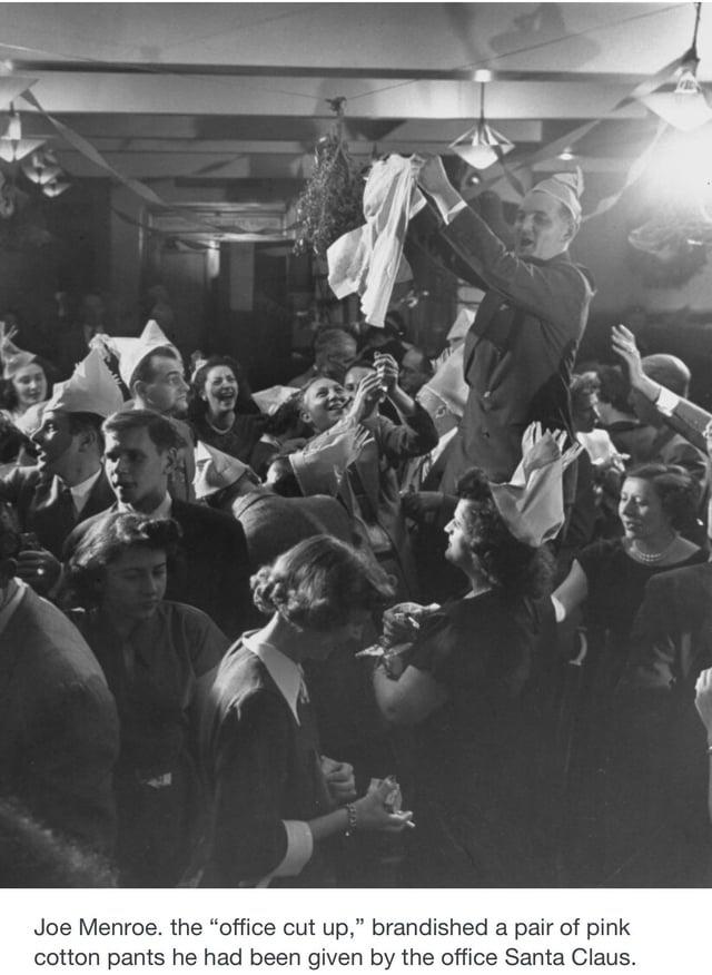 Joe Menroe. the "office cut up," brandished pair of pink cotton pants he had been given by the office Santa Claus.