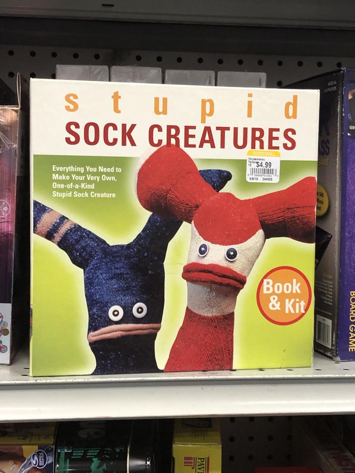 RGA OLGA AGES 64 1-4 PLAYERS SS CAME stupid SOCK CREATURES Everything You Need to Make Your Very Own, One-of-a-Kind Stupid Sock Creature GOODWILL Housewarsc Yellow 19$4.99 00000 01082 9/8/19 244505 540 Music 品質機 oo Book & Kit SPIN MASTER S PAVI GAME ETWIS