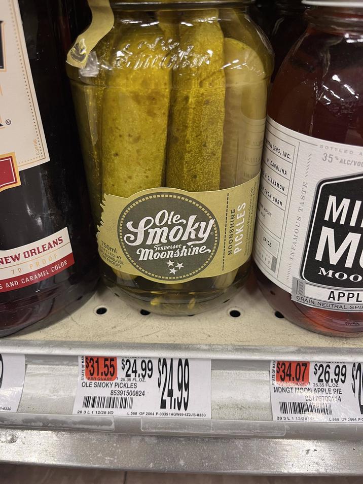 C.09196 NEW ORLEANS 70 PROOF S AND CARAMEL COLOR Ole Smoky Tennessee Moonshine 750ml BOTTLED AT 20% ALCOHOL/VOL 40 PROOF) $31.55 $24.99 PER QUART 125.35 FL.OZ OLE SMOKY PICKLES 85391500824 $249 ISTILLERS, INC. N.CAROLINA S & CINNAMON 11111 LED FROM CORN MOONSHINE PICKLES Natural Flavors and Aom with Spirits Distilled From Artificial THE ROCKS ALE SPICE wwwwww INFAMOUS TASTE BOTTLED 35% ALC/VOL MI M MOO APPL GRAIN NEUTRAL SPIR $34.07 $26.99 HDJART 25.35 FL.OZ. MDNGT MOON APPLE PIE 95176700114 S-8330 28 3 L 1 12/28 I/D L 568 OF 2064 P-3339 1AGW69-4Z2J S-8330 28 3 L 1 12/28 L569 OF 2064 P-3