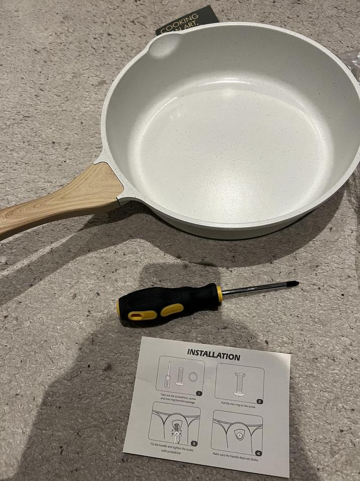 COOKING NART, INSTALLATION Take out the screwdriver, screw and iron ring from the package Put the iron ring on the screw Fix the handle and tighten the screw Make sure the handle does not shake. with screwdriver