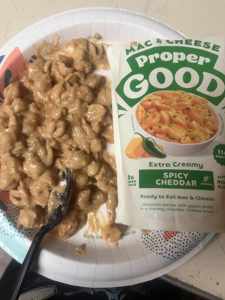 MAC & CHEESE Proper GOOD 9840S-HXO FLAVOR DESCRIPTOR OG ADDED SUGAR Extra Creamy SPICY CHEDDAR 11 PROT TAST HO MEDIUM MA Ready to Eat Mac & Cheese Jalapeño pieces with pasta shells in a creamy cheddar cheese sauce ошоо хо