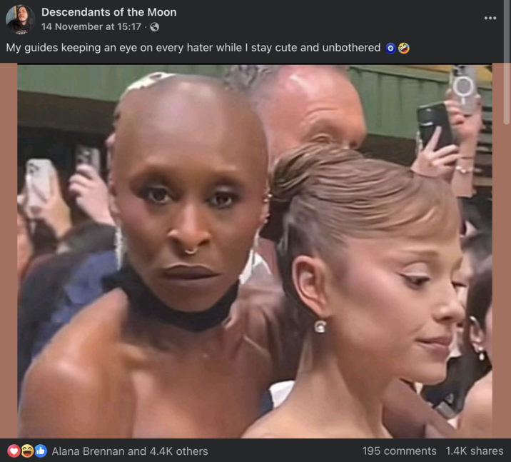 Facebook user Descendants of the Moon posted an image of Cynthia Erivo hugging Ariana Grande, writing, "My guides keeping an eye on every hater while I stay cute and unbothered 🧿"