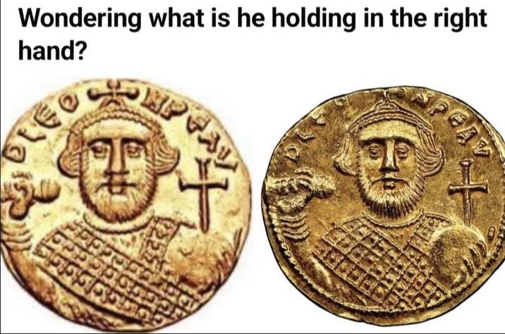 Wondering what is he holding in the right hand? 91