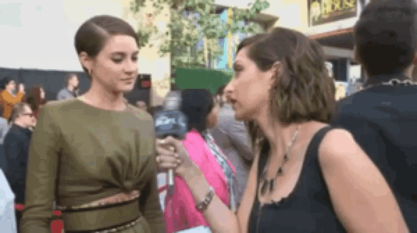 A GIF of Shailene Woodley being interviewed. She says, "Well you should probably eat."