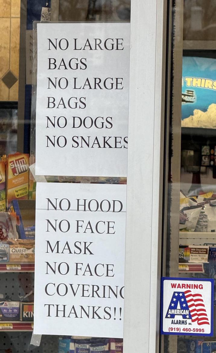 Slim Jim NACHO NO LARGE BAGS NO LARGE BAGS NO DOGS NO SNAKES THIR 6S PROTRAM NO DE SA QUEST traint As by Thy 200 KIN NO HOOD NO FACE MASK NO FACE COVERING THANKS!! APEN Forts- ND DE Mix Chocolato Peanut Butter on to TOR 20260 WARNING AMERICAN ** ALARMS INC. (919) 460-5995 QUTS QUEST