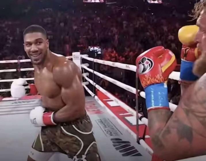 The official "meme":https://knowyourmeme.com/memes/memes template for the Anthony Joshua Smiling at Jake Paul Before Punching Him format.