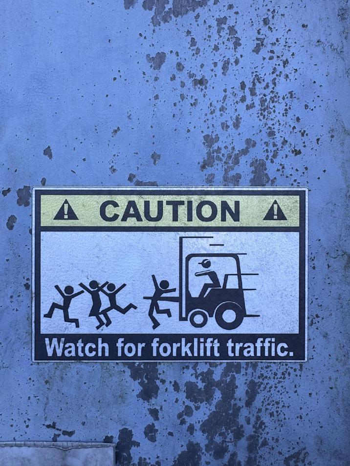 A CAUTION A Watch for forklift traffic.