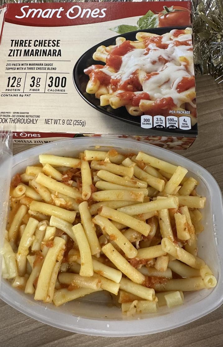 Smart Ones THREE CHEESE ZITI MARINARA ZITI PASTA WITH MARINARA SAUCE TOPPED WITH A THREE CHEESE BLEND 12g 3g 300 PROTEIN CONTAINS 8g FAT FIBER CALORIES LARGED PHOTO-SERVING SUGGESTION EP FROZEN SEE COOKING INSTRUCTIONS OOK THOROUGHLY NET WT. 9 OZ (255g) rt Ones CHEESE ZITI MA PER PACKAGE 3.5 590mg 49 MAWA 300 CALORIES SAT FAT 18% DV SODIUM 25% DV TOTAL SUGARS