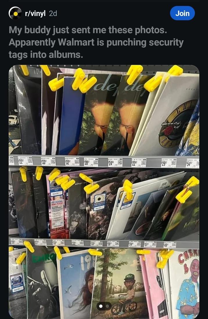 r/vinyl 2d Join My buddy just sent me these photos. Apparently Walmart is punching security tags into albums. de de de GREAT 29 500 EXCLUSIVE $227 333 $32 MAR EXCLUSIV Siver MOTLEY C MF DOOM MM FOOD $287 $24 $227 $2997 $5497 EXCLUSIVE 27 33 33 3326 #24 31 TAYLOR HOLF 49 CHEM