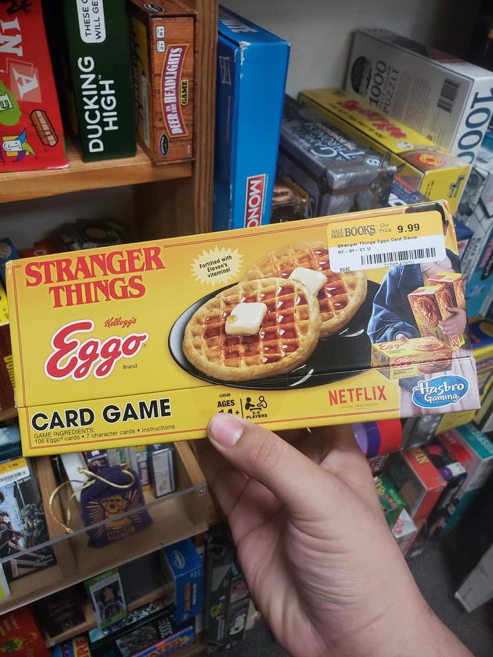 7.99 RE JUME DUCKING THESE C HIGH WILL GET DEER HEADLIGHTS GAME STRANGER THINGS Kellogg's Eggo Brand CARD GAME GAME INGREDIENTS: 106 Eggo cards 7 character cards instructions. Fortified with Eleven's vitamins! C4548 AGES 4+ 2.6 PLAYERS 750 MARVEL MONO SNOWH 1000 PUZZLE Our HALF BOOKS Price 9.99 PRICE. Stranger Things Eggo Card Game 07-31-21 U 033C Eggo 3158547830 NETFLIX OFFICIAL MERCHANDISE Hasbro Gaming SUSPICI 1000