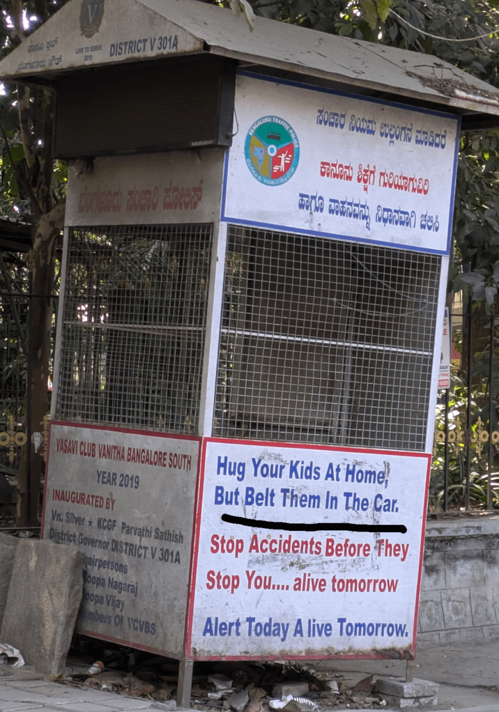 ಬೆಂಗಳೂರು ಘಟ್ LIVE TO SERVE DISTRICT V 301A 2019 BENGALURU TRAFFIC POLIC ಸಂಚಾರ ನಿಯಮ ಉಲ್ಲಂಗನ ಮಾಡಿದರೆ ಕಾನೂನು ಶಿಕ್ಷೆಗೆ ಗುರಿಯಾಗುವಿಲ ಹಾಗೂ ವಾಹನವನ್ನು ನಿಧಾನವಾಗಿ ಚಚಿಸಿ VASAVI CLUB VANITHA BANGALORE SOUTH Hug Your Kids At Home! YEAR 2019 INAUGURATED BY But Belt Them In The Car. Vn, Silver KCGF Parvathi Sathish Stop Accidents Before They District Governor DISTRICT V 301A Stop You.... alive tomorrow hairpersons Roopa Nagaraj oopa Vijay mbers Of VCVBS Alert Today A live Tomorrow.